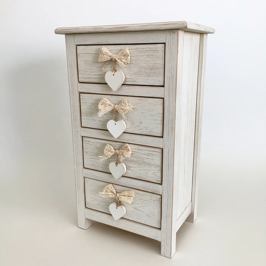 Commode à tiroirs aux lignes épurées, coloris blanc